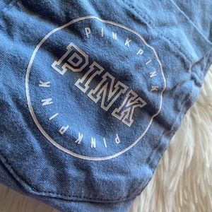Pink Victoria’s Secret t shirt.